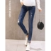 Quần bà bầu mùa xuân Thời trang mặc ngoài Quần jean bà bầu Tide Mom Thin Thin Stretch Cotton Quần khi mang thai - Phụ nữ mang thai quần / quần bụng