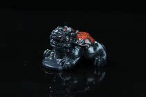 Guilin chicken blood jade hand toy piece carved piece red on black background