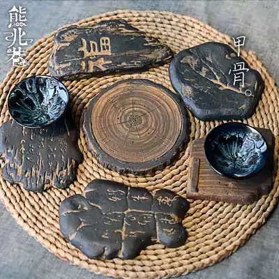 Creative Zen handmade antique pot holder Black small tea holder coaster Tea mat Old pot holder coarse pottery mat Armor bone