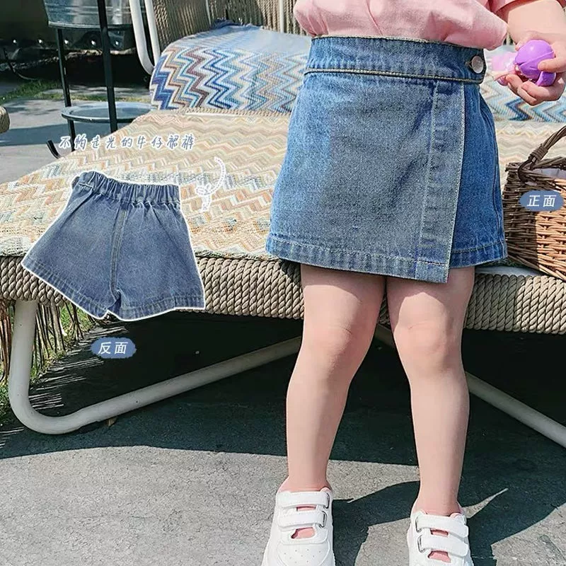 Quần short denim cô gái 2020 quần áo trẻ em mùa hè thoáng khí quần giả váy jean quần âu mặc ngoài phong cách nước ngoài - Quần jean