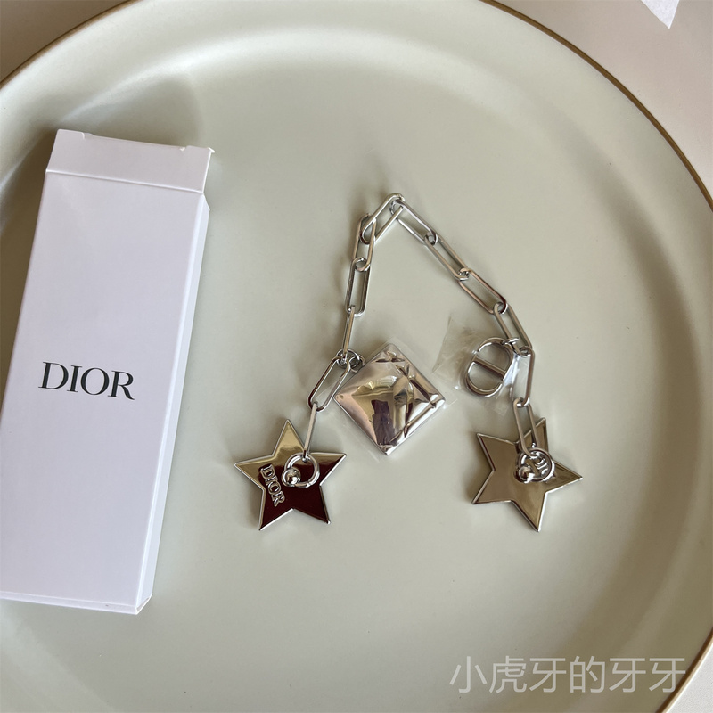 Dior Silver Star Phone Chain New Model Pendant Can Be DIY into a Bracelet Cannage Pattern Cd Lucky Star Dior Silver Star Phone Chain New Model Pendant Can Be DIY into a Bracelet Cannage Pattern Cd Lucky Star