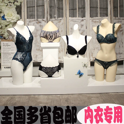 Нижнее белье, манекен головы, юбка в складку, пластиковый бюстгалтер, физиологичные утягивающие легинсы, стенд