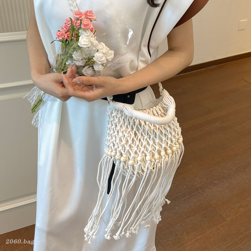 Bohemian Style Hand-Woven Tassel Bag for Women 2026 Summer New Holiday Style Beach Bag Hollow Woven Bag