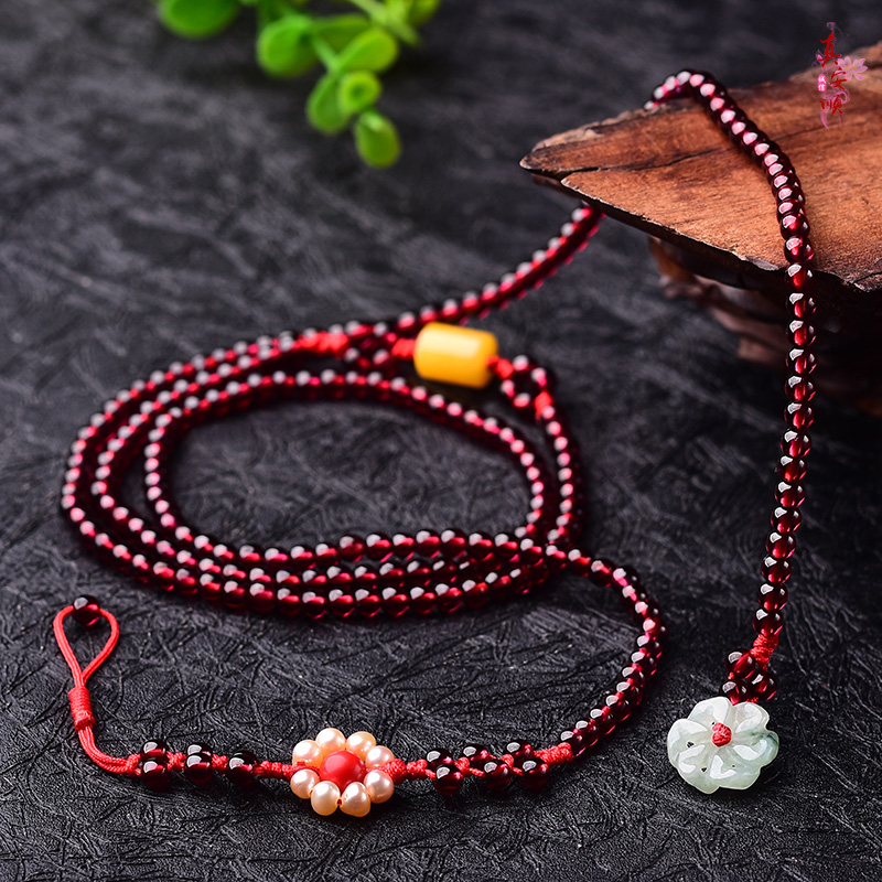 Zhen Anshun is a tiger's birth year waist chain female natural garnet raw ore beeswax pearl gemstone fashion sexy belt