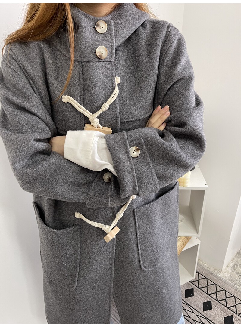 The new loose high gray woolen coat in 2021 is a new loose high - gray - haired coat