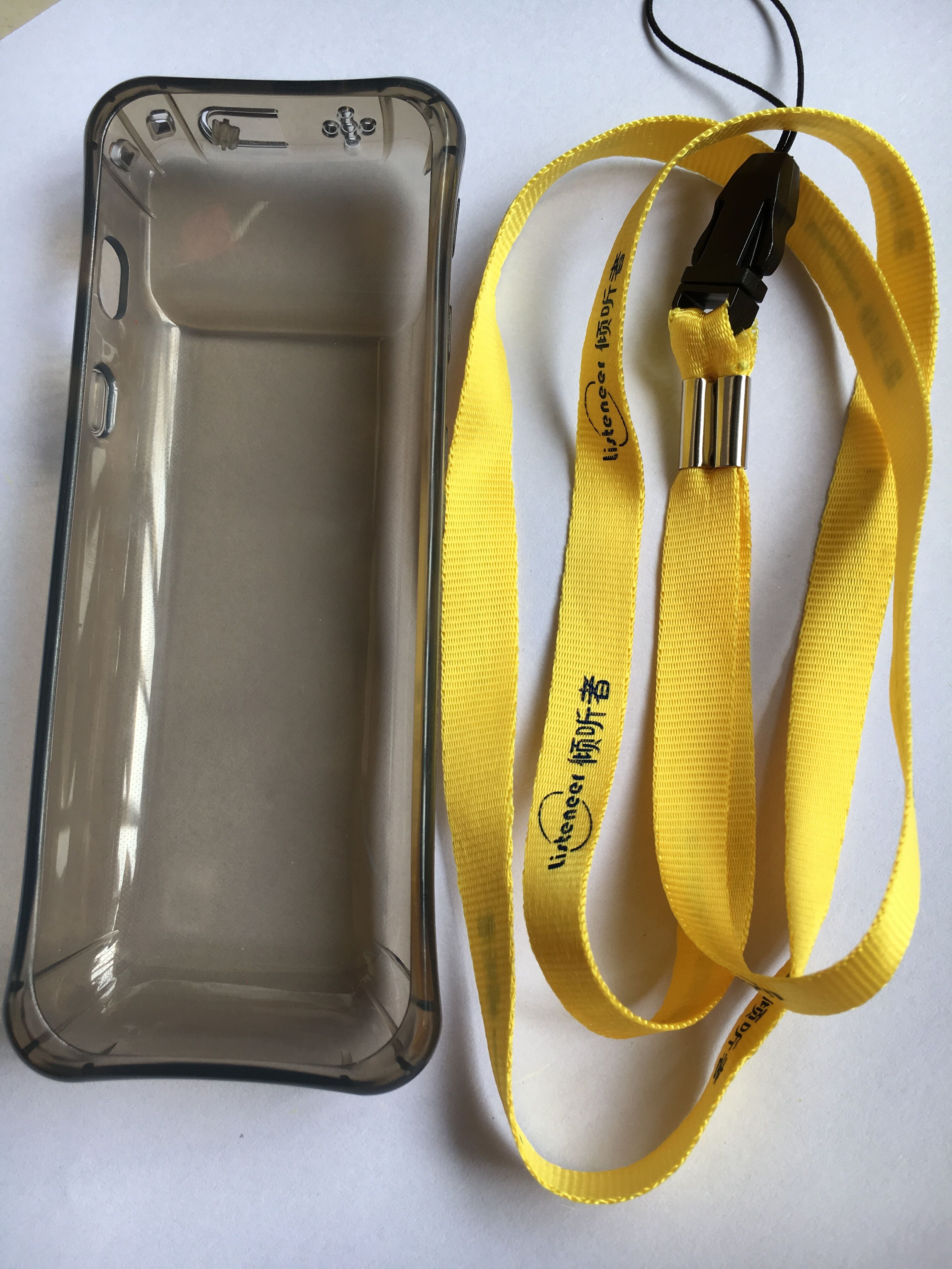 One (silicone cover) One (lanyard)