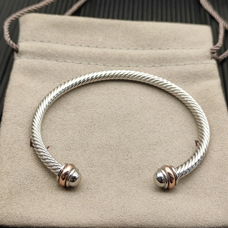 David Yurman Gold and Silver Twisted Wire Open Cuff Bracelet Two-Tone Dy Twisted Pattern Silver and Gold David Yurman Gold and Silver Twisted Wire Open Cuff Bracelet Two-Tone Dy Twisted Pattern Silver and Gold