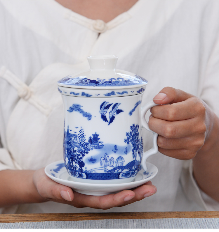 Ceramic tea set four cups of blue and white porcelain filtering cup of individual water cup with cover to filter the office tea cup