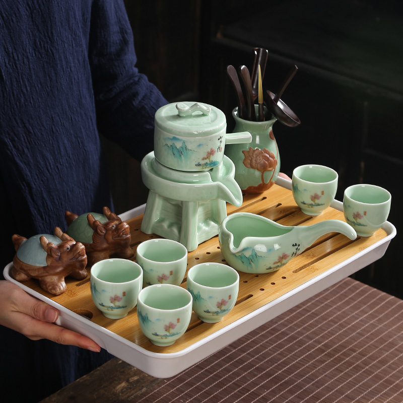 Automatic purple sand tea set home sitting room Shi Mopan lazy teapot office fortunes cups