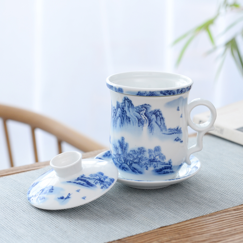Ceramic tea set four cups of blue and white porcelain filtering cup of individual water cup with cover to filter the office tea cup