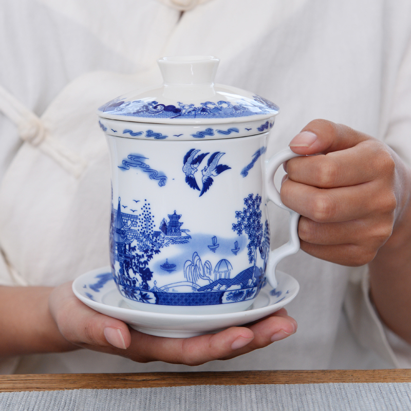 Ceramic tea set four cups of blue and white porcelain filtering cup of individual water cup with cover to filter the office tea cup