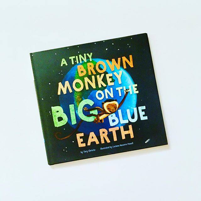 Luciana Powell) A Tiny Brown Monkey on the Big Blue Ear-Tao