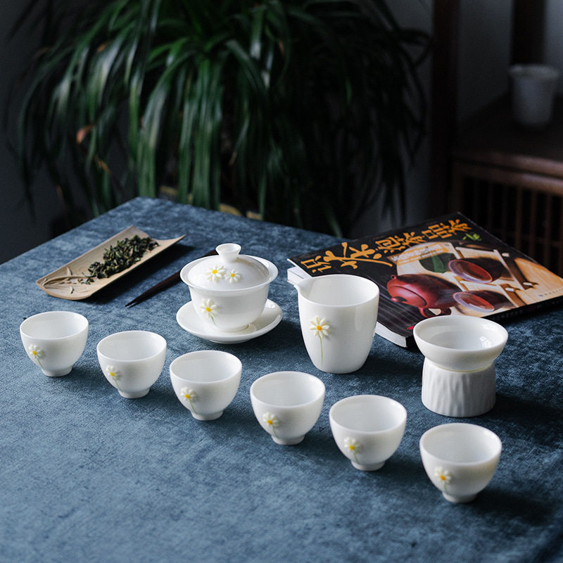Sheep fat jade white porcelain kung fu tea set complete set of home office creative chrysanthemum gift box small Chinese simple cover bowl