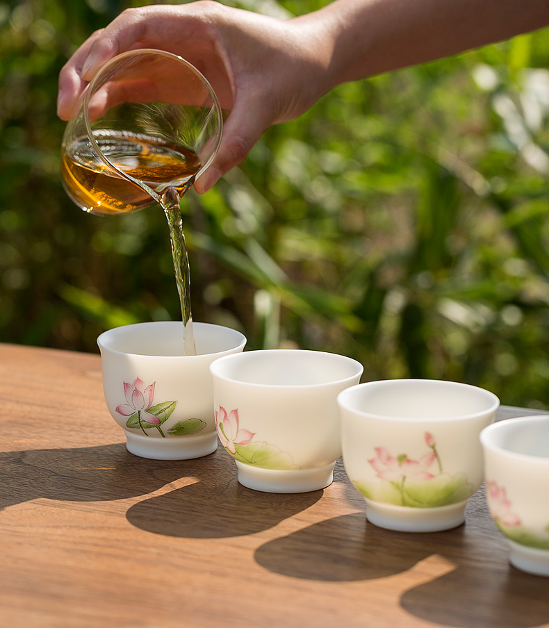 Tang dehua white porcelain shed suet jade hand draw lotus tea cup, bowl of household kung fu tea set personal sample tea cup