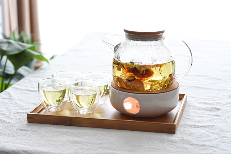 Brewed fruit tea pot teapot set transparent heat - resistant glass heat insulation base firing candles