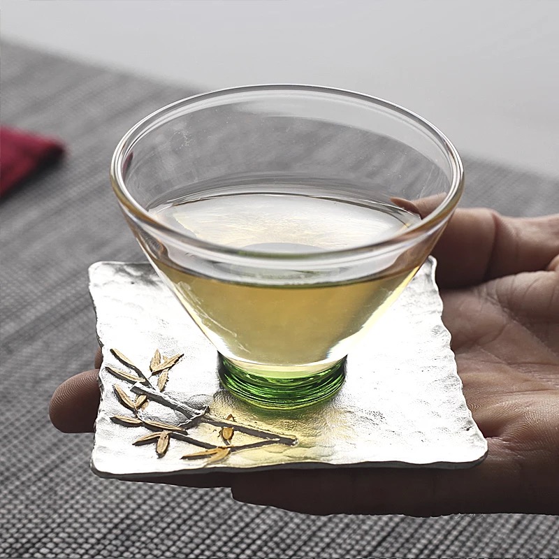Babson d kung fu tea cup mat creative name plum blossom put a Japanese tea taking at the manual pure tin cup mat accessories insulated tea set