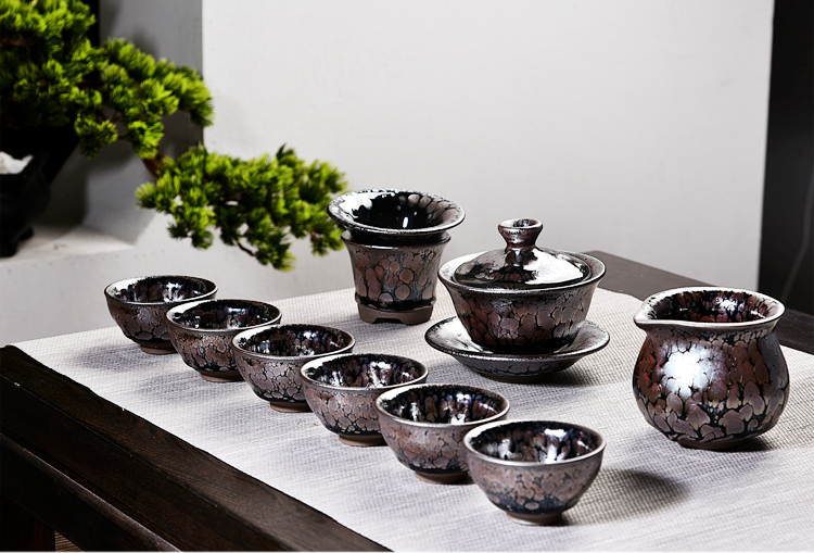 Ancient sheng up jianyang iron tire oil building light tea set home oil drops ceramic kung fu tea teapot teacup group