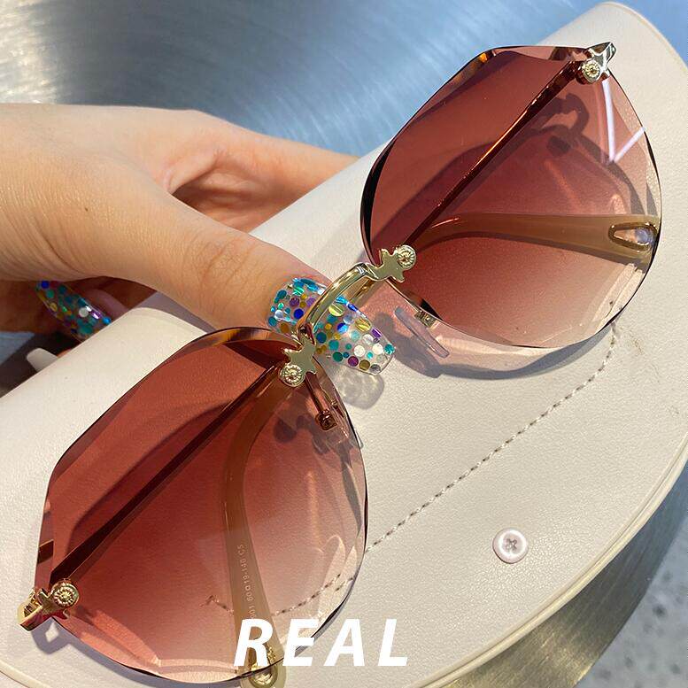 Hong Kong I TGREG new fashion natural crystal frameless edge seaside net red anti-UV sunglasses tide