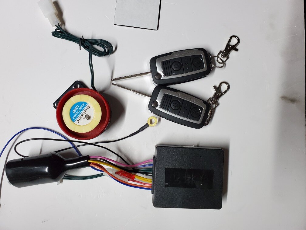 Locomotive anti-theft device 12V universal with a key to start the key bomb key 2 1 alarm anti-theft device