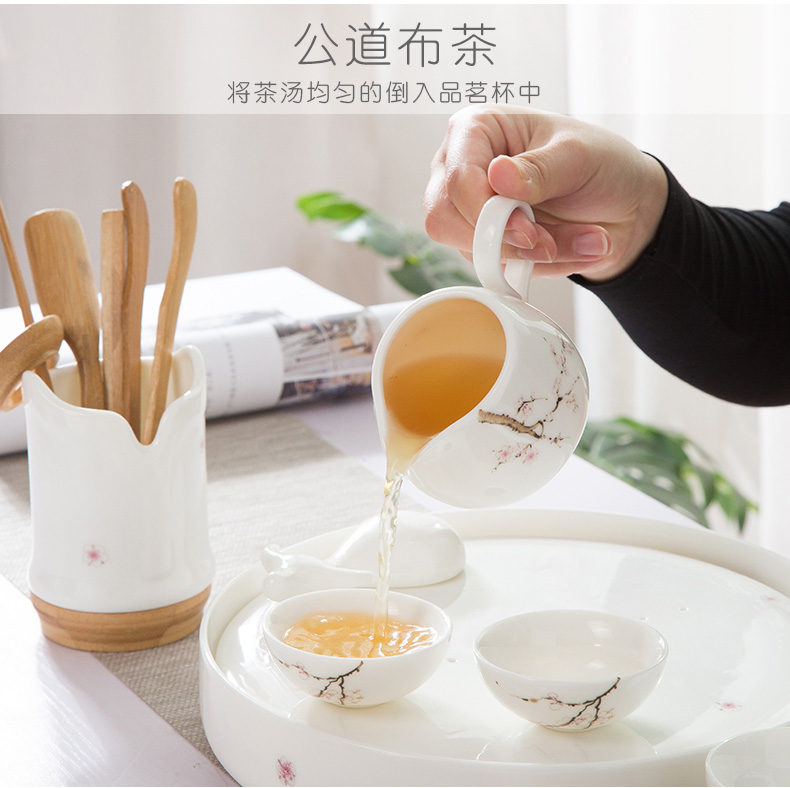 A complete set of dehua white porcelain suet jade suit household green kung fu tea set ceramic tea tray was contracted tea table