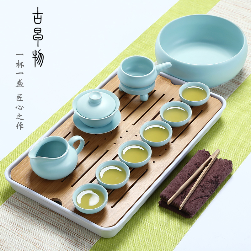 Your up with porcelain of a complete set of kung fu tea set suit household porcelain travel portable cup lid bowl of Japanese tea tray