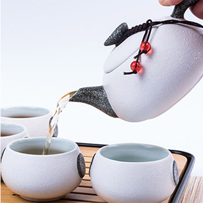 A crack cup pot 2 travel two cups of tea A portable set of snowflakes kung fu ceramic teapot is suing travel package