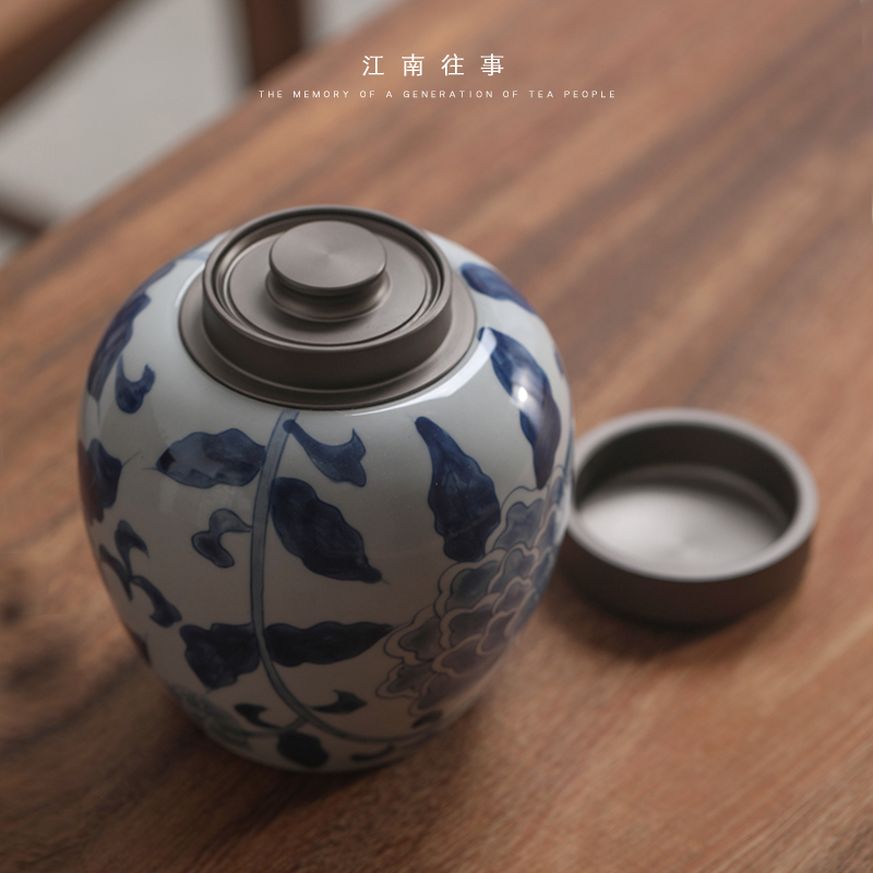 Jiangnan past blue and white porcelain tea pot aluminum alloy cover seal pot kung fu tea set store receives household storage tank