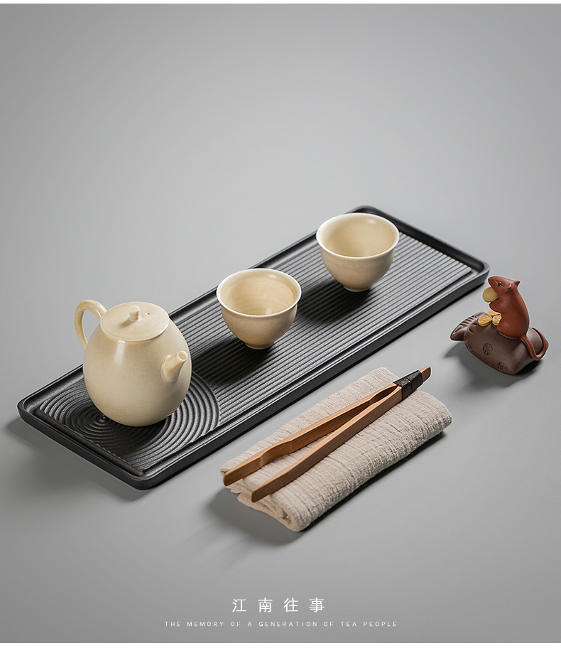 Jiangnan tea past small black pottery dry ground plate household dry landscape kunfu tea tray bearing small pot of tea