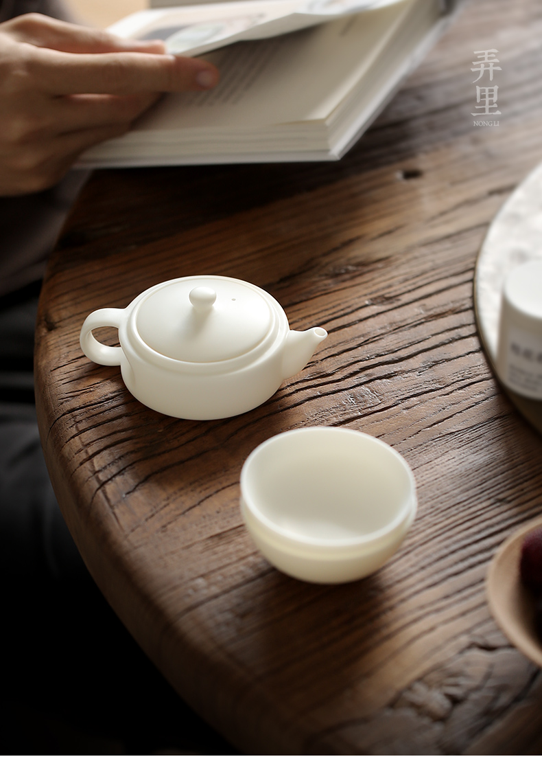 Travel tea set ceramic cups kung fu dehua white porcelain cup to crack a pot of two cups of Japanese portable teapot