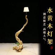 Nước vàng rễ cây chạm khắc nghệ thuật đèn đứng hạ cánh với nhà đơn giản mới phong cách Trung Quốc trang trí quốc gia trang trí - Các món ăn khao khát gốc