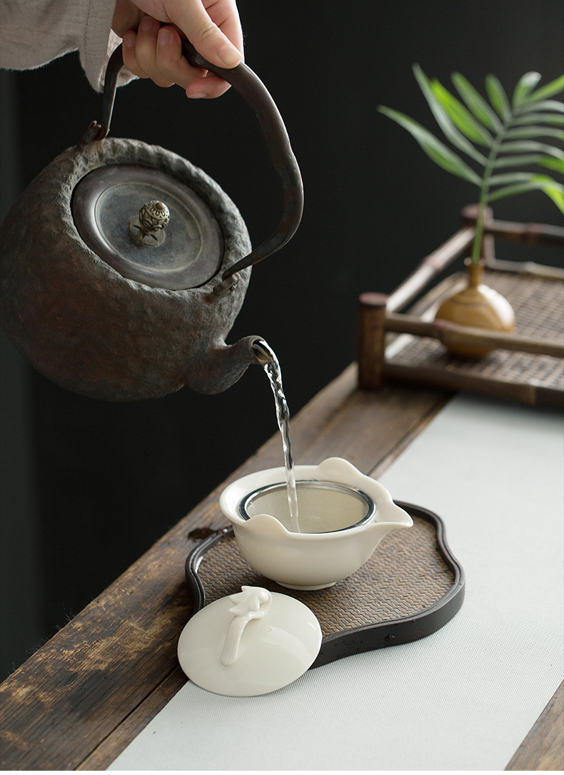 Dehua lard white porcelain hand grasp pot of ceramic kung fu tea tureen filter to use cups with three bowls of household