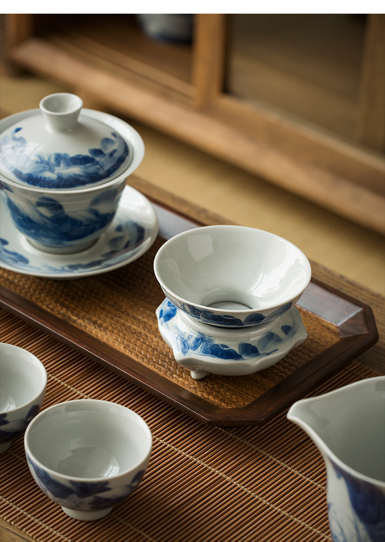 Jingdezhen hand - made) ceramic filter filter kung fu tea set of blue and white porcelain tea tea with parts across indicates the tea