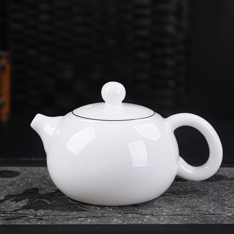 Dehua ceramic teapot suet jade kung fu tea set the whole household manual white porcelain beauty filtering pot of tea pot