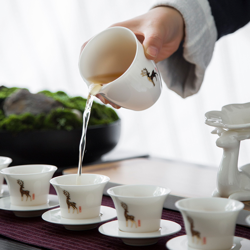 Suet jade porcelain kung fu tea set suit household dehua white porcelain tea set teapot teacup of a complete set of gift box