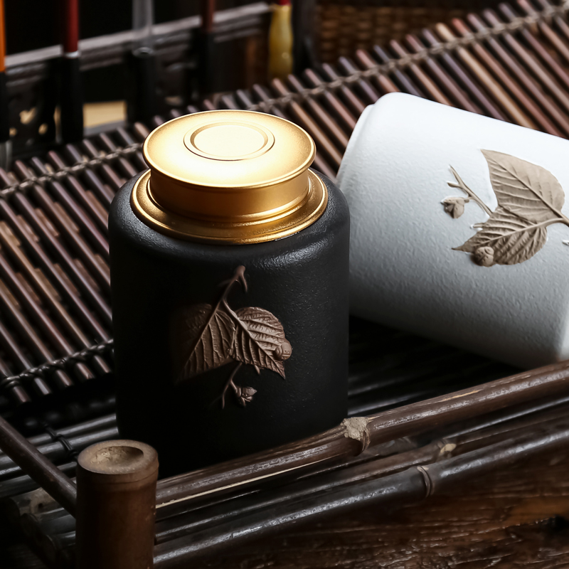 Maple leaf carvings, black pottery tea pot size household kung fu tea set sealing goods tea accessories