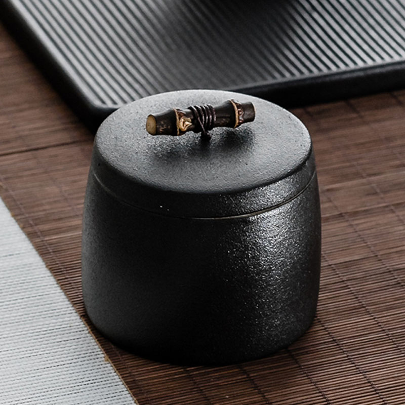 Black pottery tea pot small green tea packaging box storage POTS ceramic storage tank manual zizhu cover button to wake POTS