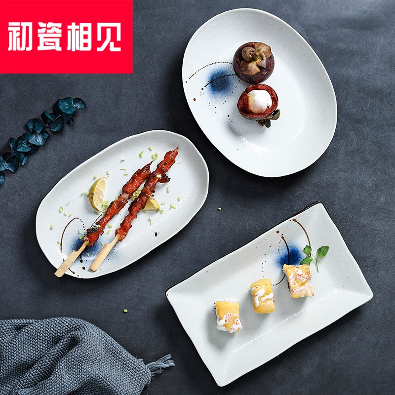 Porcelain meet each other at the beginning of the fish dish ceramic household large creative Japanese plate elliptical steamed fish dish under the glaze color A57