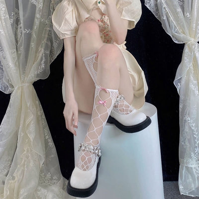 taobao agent Personalized niche hollow net socks Japanese lolita sweet soft girl bow calf socks girl middle socks thin