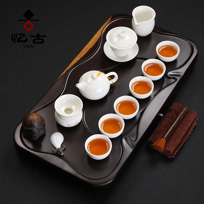 Have the ebony wood tea set of a complete set of kung fu tea set household contracted solid wood tea tray ceramic cup of tea