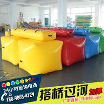 Fun Games props groups pull together new thickened inflatable caterpillars to cross the river