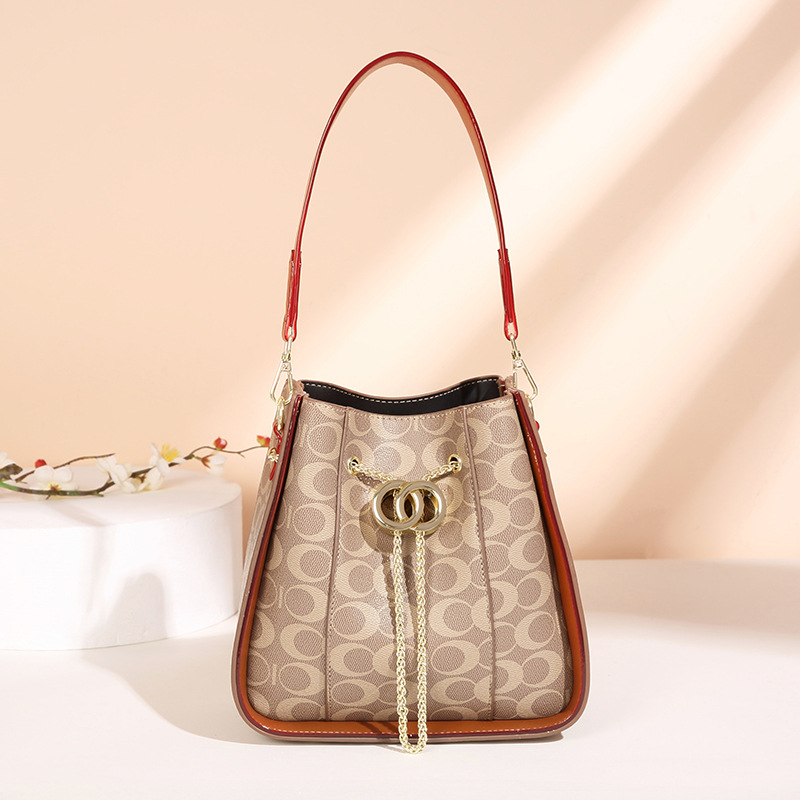 Hong Kong cat pet bag universal bucket bag female oblique cross bag old flower fashion bunch mouth shoulder handbag tide 1898