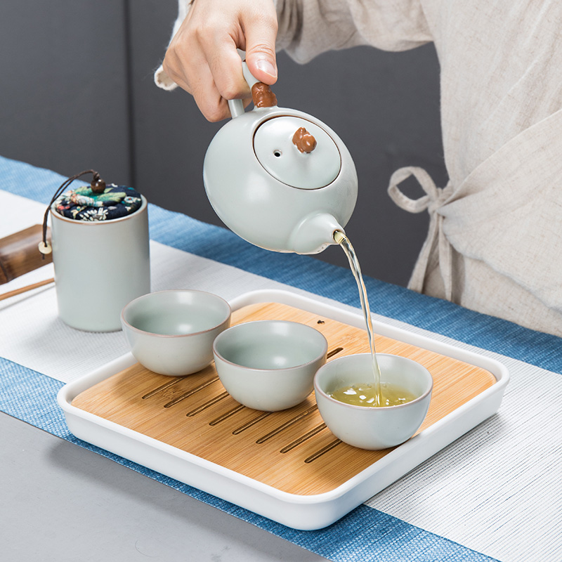 Travel tea set suit portable package ceramic cup to crack a pot of two cups of kung fu tea set suit household whole tea tray