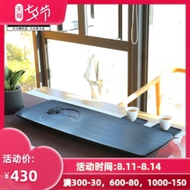 Zhixintang handmade whole piece of natural black gold stone tea tray Stone head tea table drainage household black gold stone tea sea simple