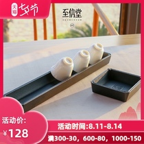 Zhixintang whole piece of natural black gold stone handmade Begonia corner Teacup holder Teacup holder Small tea tray Tea ceremony tea set accessories