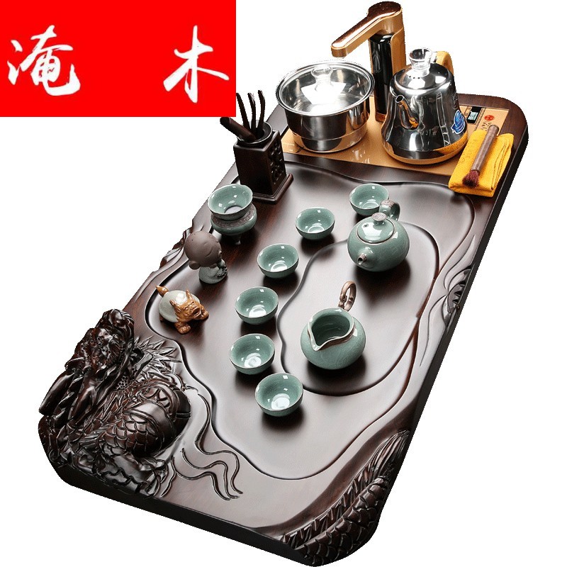 Flooded the whole piece of ebony wood tea tray was the home of a complete set of violet arenaceous kung fu tea set four unity induction cooker tea set