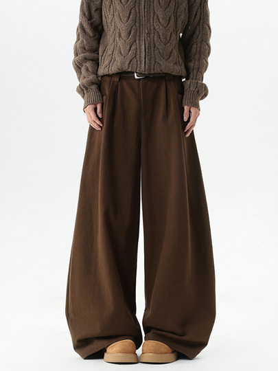 Brown lazy and relaxed jeans for men, winter fashion brand loose wide-leg scimitar pants with design and slightly flared floor-length pants.