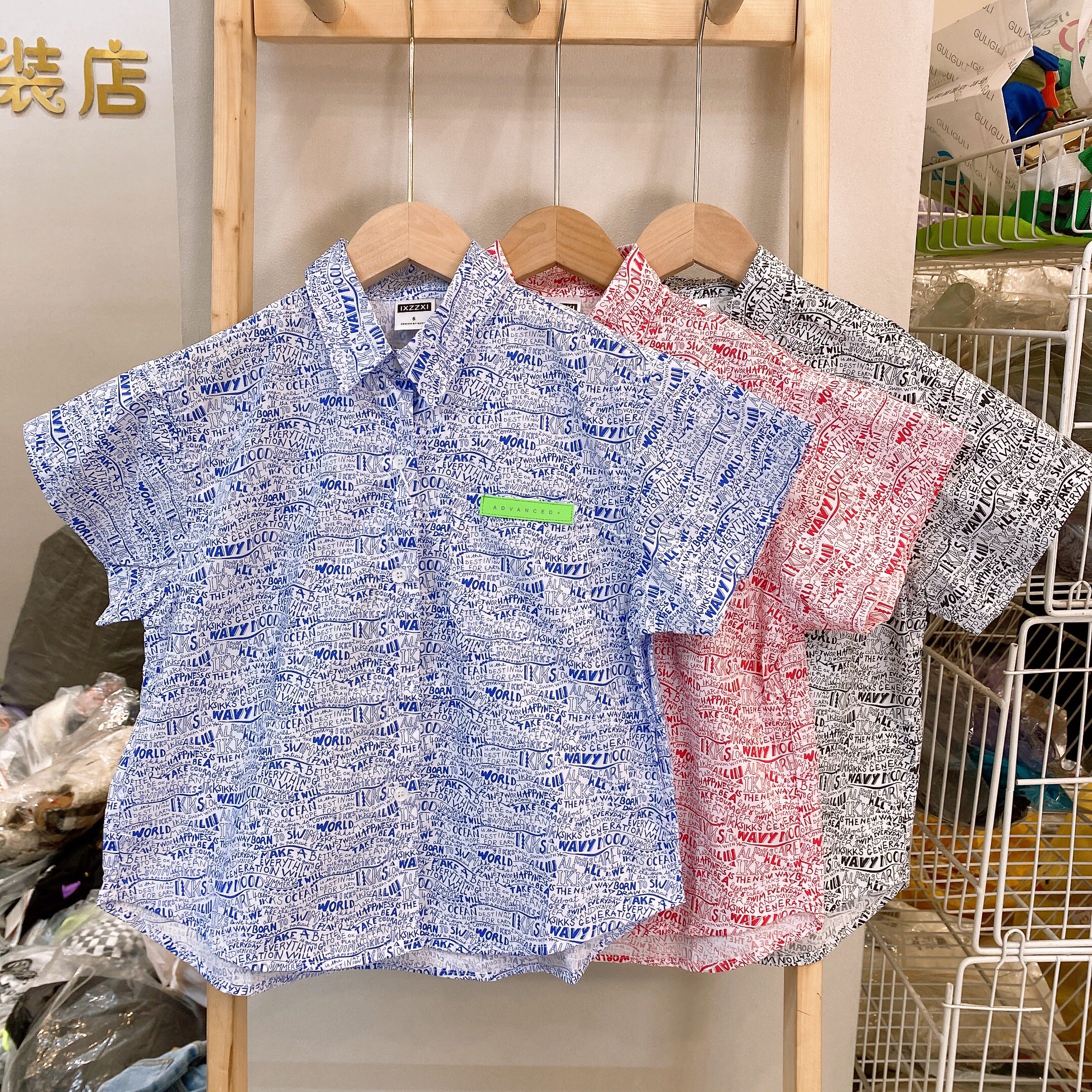 Brand summer 100-170 yards children's medium and big children full of printed letters Hong Kong style loose short-sleeved shirt 6668 can be parent-child