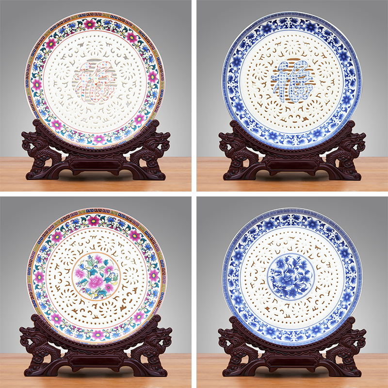 Jingdezhen ceramics hollow - out decorative plate famille rose porcelain hotel club house sitting room adornment household hang dish arts and crafts