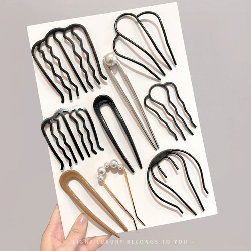 Голова маруко фиксирует артефакт самка u -в форме волос. Новая задняя головка