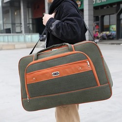 i4 ຄວາມຈຸຂະຫນາດໃຫຍ່ພິເສດ canvas portable travel bag men and women's luggage bag quilt moving bag ຖົງຂະຫນາດໃຫຍ່ພິເສດ